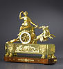 An extremely fine Empire gilt bronze chariot clock of eight day duration, the white enamel chapter ring with black Roman numerals and a pierced palmette centre with blued steel hands for the hours and minutes set within the wheel of a chariot